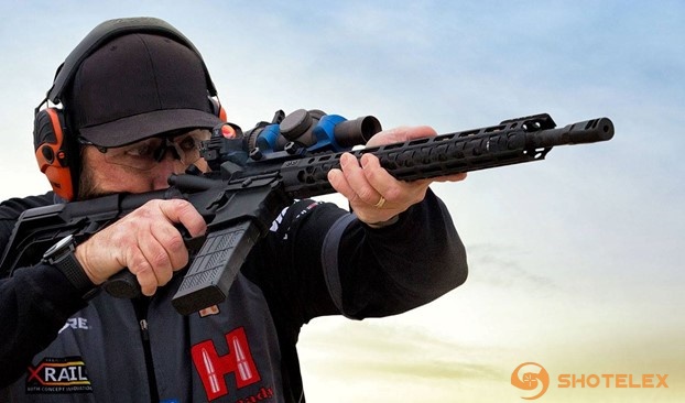 shooter-using-a-warne-45-degree-mount-for-red-dot